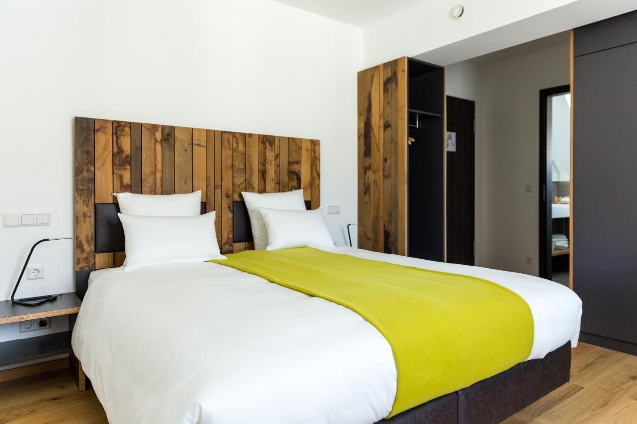 Hotel Terrace Bettendorf Bagian luar foto